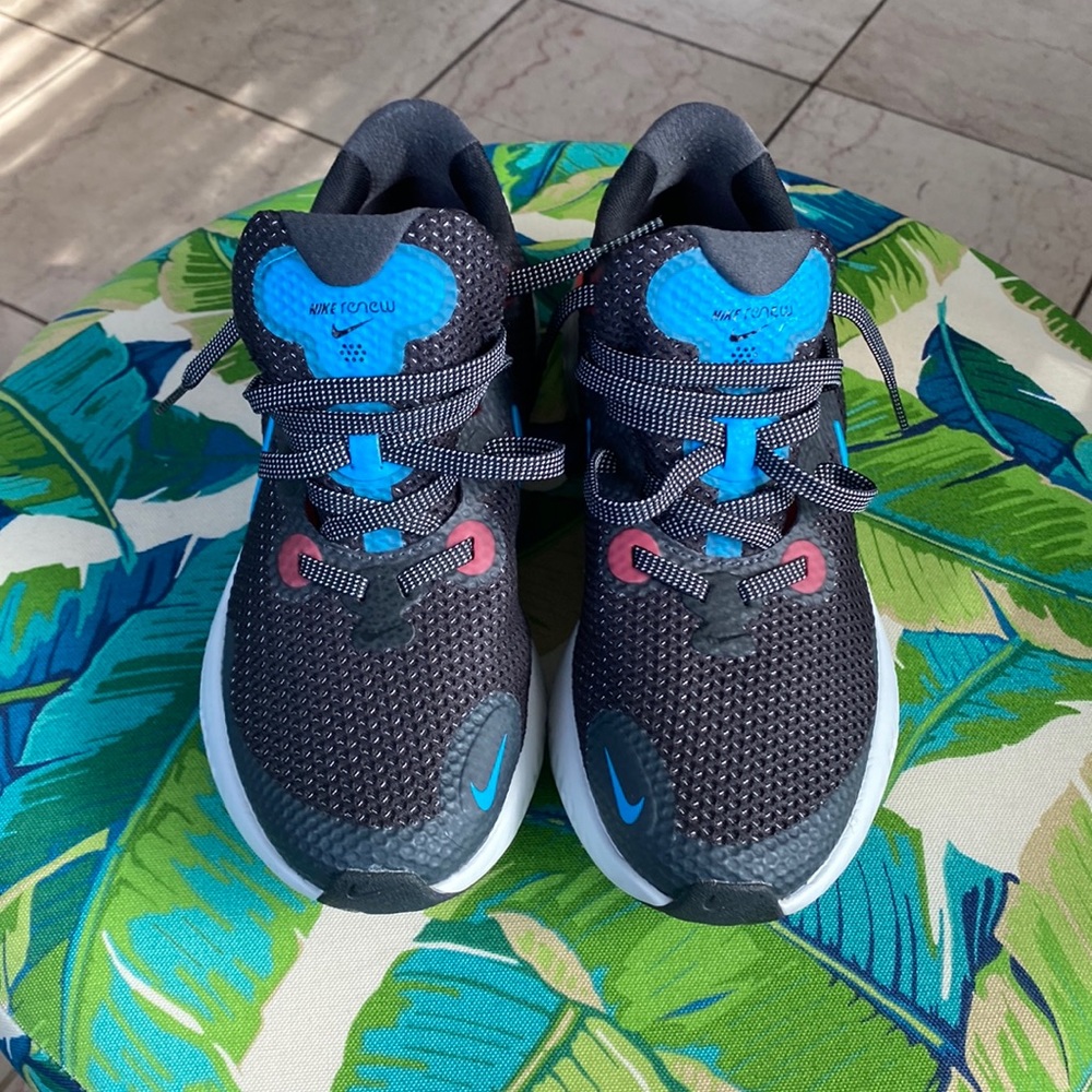 Nike Women’s Black Athletic Sneakers with Blue and Pink Accents